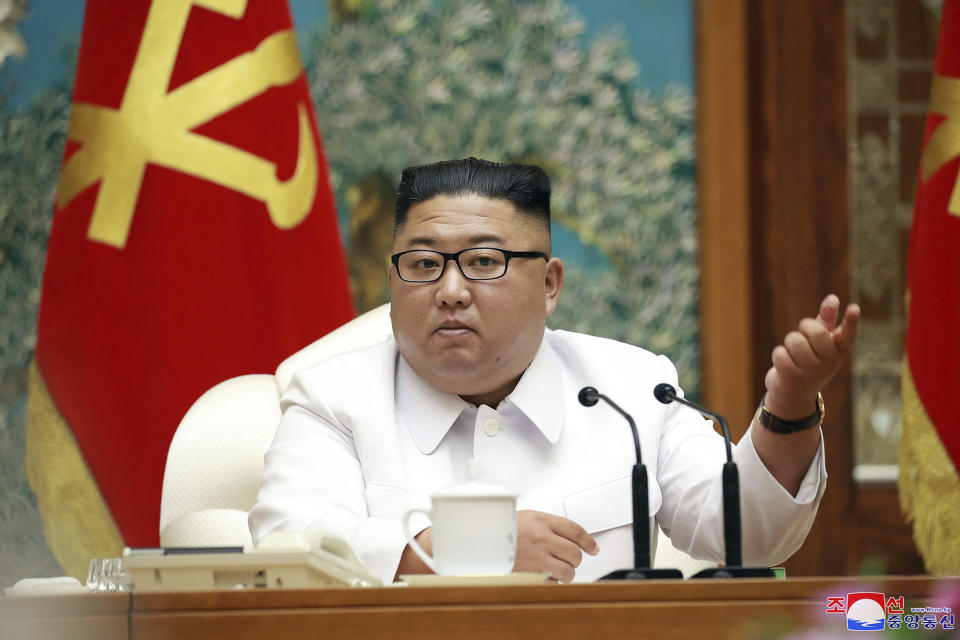 In this photo provided by the North Korean government, North Korean leader Kim Jong Un attends an emergency Politburo meeting in Pyongyang, North Korea Saturday, July 25, 2020. Independent journalists were not given access to cover the event depicted in this image distributed by the North Korean government. The content of this image is as provided and cannot be independently verified. Korean language watermark on image as provided by source reads: "KCNA" which is the abbreviation for Korean Central News Agency. (Korean Central News Agency/Korea News Service via AP)