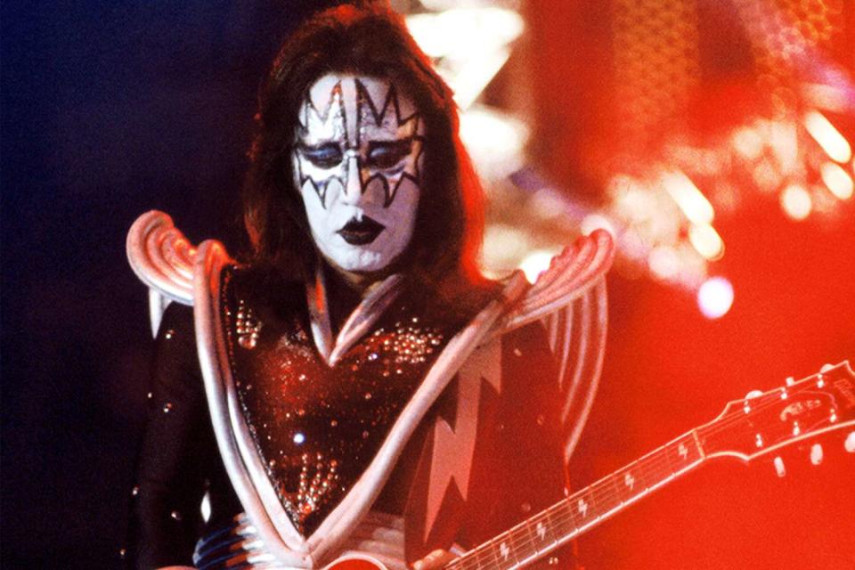 <p> Tim Mosenfelder/Getty</p> Ace Frehley performs with Kiss in 2000.