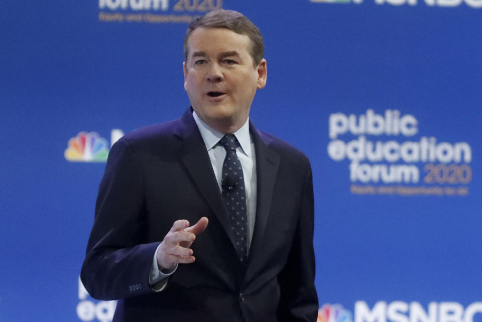 Democratic presidential candidate Sen. Michael Bennet, D-Colo., one of seven scheduled Democratic candidates participating in a public education forum, gives an opening statement, Saturday, Dec. 14, 2019, in Pittsburgh. Topics at the event planned for discussion ranged from student services and special education to education equity and justice issues. (AP Photo/Keith Srakocic)
