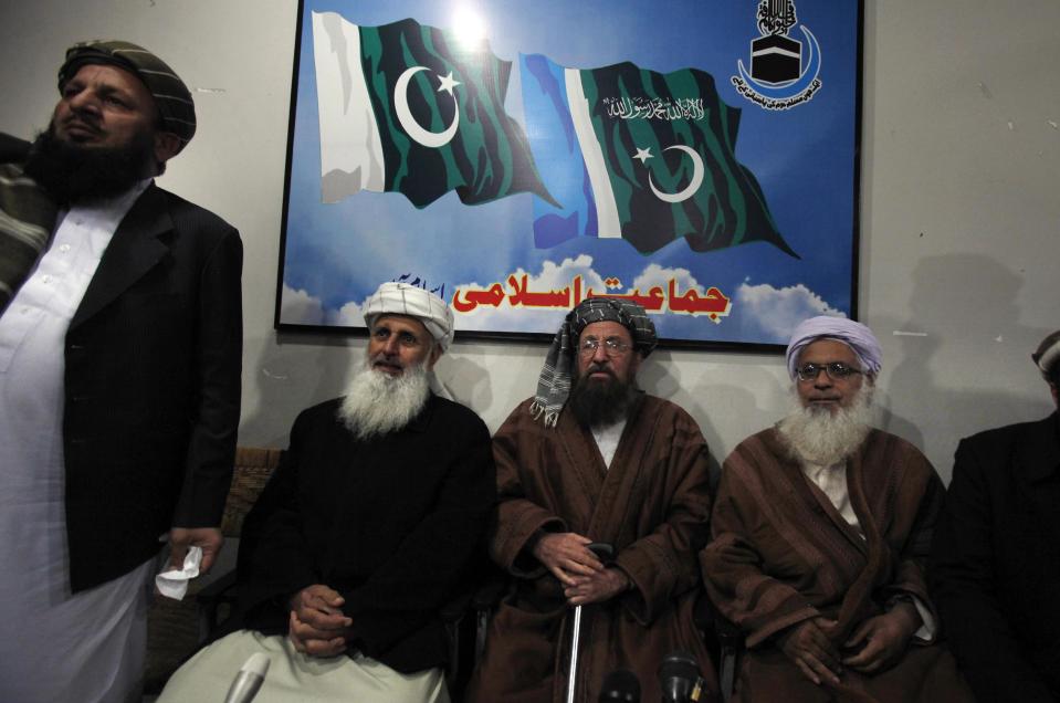 In this Tuesday, Feb. 4, 2014 photo, negotiators from Pakistani Taliban committee, from left to right, Maulana Yousaf Shah, Ibrahim Khan, Maulana Sami-ul-Haq, and Maunala Abdul Aziz, hold a press conference in Islamabad, Pakistan. The Pakistani government has recently opened negotiations with domestic militants called the Pakistani Taliban designed to end years of fighting in the northwest that has cost thousands of lives and forced hundreds of thousands of people to flee their homes. (AP Photo/Anjum Naveed)