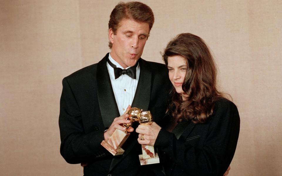 With her Cheers colleague Ted Danson at the Golden Globes in 1991 - Doug Pizac/AP