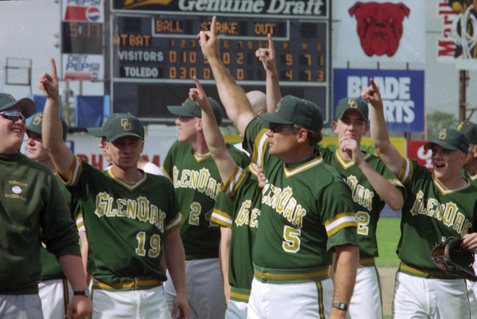 GlenOak baseball coach Joe Gilhousen celebrates with his team after the Golden Eagles' 9-4 win over Cincinnati La Salle in the Division I state championship game, Saturday, June 3, 1995.