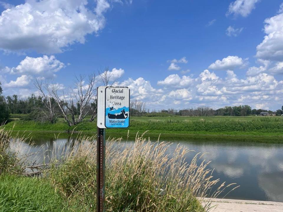 A sign marks a canoe and kayak launch site along the Rock River in Jefferson County on Aug. 1, 2023.