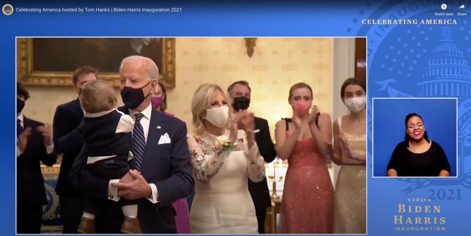 President Joe Biden and first lady Jill Biden watch the Inaugural Celebrations from the Blue room inside the White House, Jan. 20, 2021.