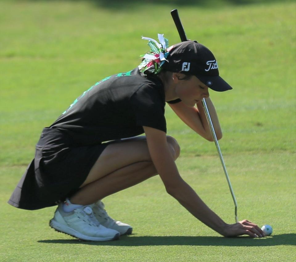 Wall High School's Sam Lehr marks her ball before putting during the final round of the UIL Class 3A Girls State Golf Tournament at Jimmy Clay Golf Course in Austin on Tuesday, May 17, 2022.