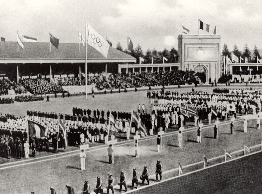 <p>New traditions emerged this year: The official flag bearing the Olympic Games five-ring logo, the Olympic oath for athletes, and the release of doves to symbolize peace. </p>