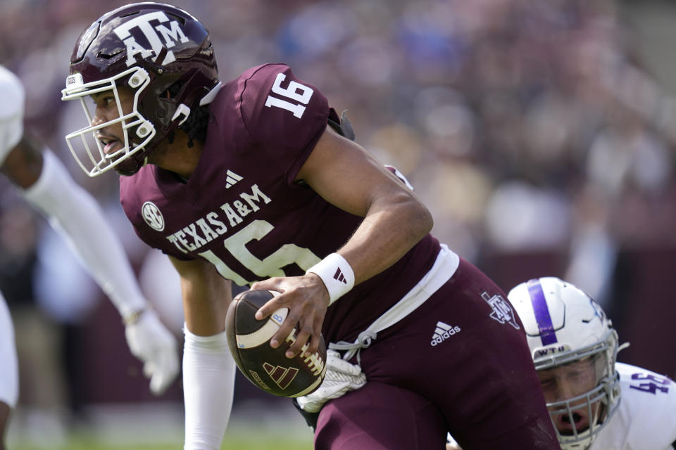 Abilene Christian linebacker Cirby Coheley (46) sacks Texas A&M quarterback Jaylen Henderson (16) during the first quarter of an NCAA college football game Saturday, Nov. 18, 2023, in College Station, Texas. (AP Photo/Sam Craft)