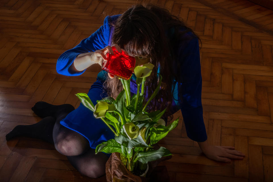 3:40 P.M. Watering the plant | Lucia Buricelli for TIME