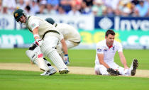 Australia's Steve Smith runs past a dejected James Anderson during day two of the Fourth Investec Ashes test match at the Emirates Durham ICG, Durham.