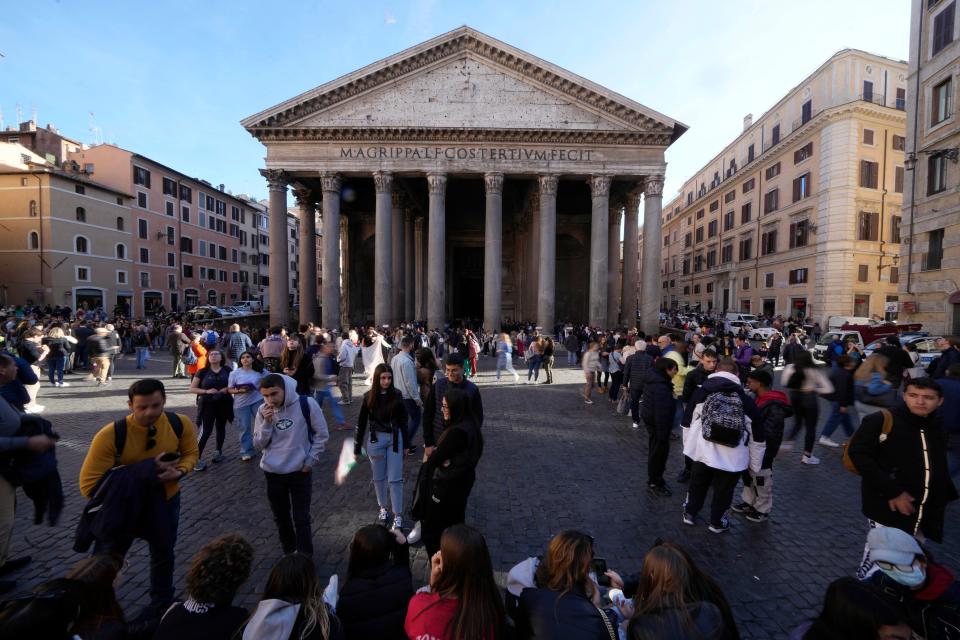 Tourists queue to visit the Pantheon in Rome, Thursday, March 16, 2023.
