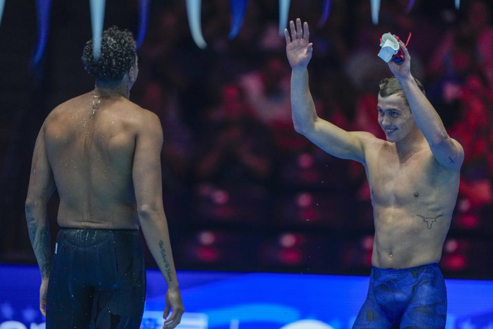 Shaine Casas and Carson Foster celebrate after the Men's 200 individual medley finals Friday, June 21, 2024, at the US Swimming Olympic Trials in Indianapolis. (AP Photo/Michael Conroy)