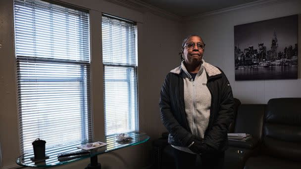 PHOTO: Barbara Massey Mapps stands in the living room of her sister Katherine 'Kat' Massey's home in Buffalo, New York. Her sister was among 10 Black people killed in a racially motivated mass shooting at a Buffalo supermarket on May 14, 2022. (Malik Rainey for ABC News)