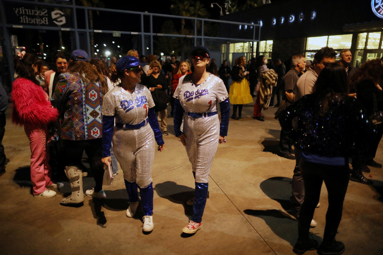 Fans walk in to see Elton John perform, as he wraps up the U.S. leg of his Farewell Yellow Brick Road Tour at Dodger Stadium. (Photo: Reuters/David Swanson)