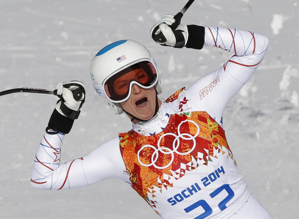 United States' Julia Mancuso celebrates after finishing the downhill portion of the women's supercombined at the Sochi 2014 Winter Olympics, Monday, Feb. 10, 2014, in Krasnaya Polyana, Russia.(AP Photo/Christophe Ena)