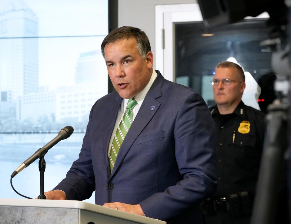 Columbus Mayor Andrew Ginther addresses the media Monday during a press conference at city police headquarters after a violent weekend that saw three seperate shootings early Saturday morning, including an incident in the Short North that wounded 10 and closed the area for hours.