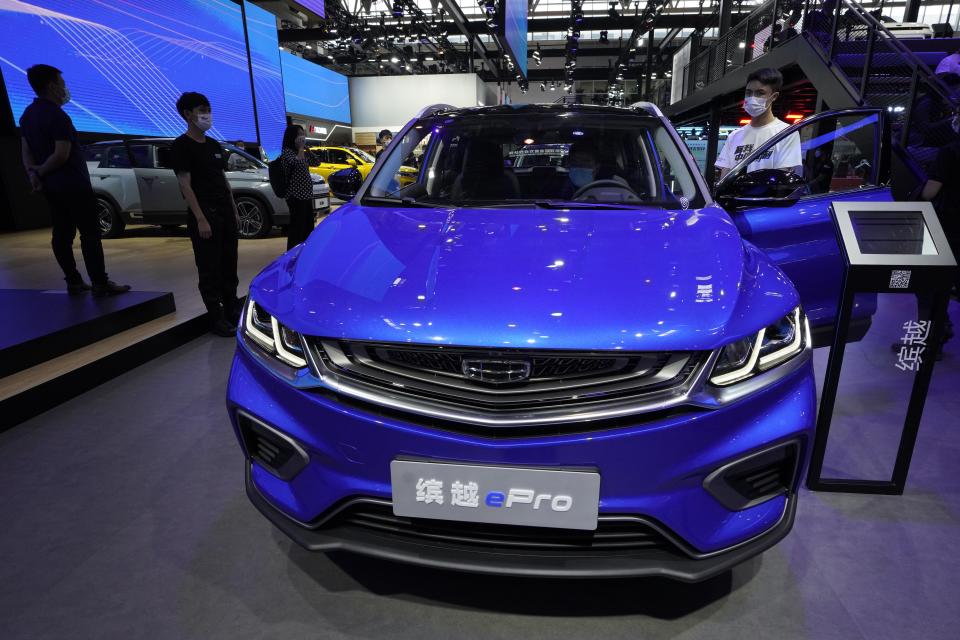 The plug-in hybrid Bingyue ePro from Geely is displayed at the Auto China 2020 show in Beijing on Sunday, Sept. 27, 2020. Chinese automaker Geely said Monday, Jan. 11, 2021, it will form an electric car venture with tech giant Baidu, adding to a flurry of corporate tie-ups in the industry to share soaring technology development costs. (AP Photo/Ng Han Guan)