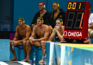 Australia's men's water polo team look on with one second to go before losing to Spain in their preliminary round group A Water Polo match at the London 2012 Olympic Games, Thursday, Aug 2, 2012. Spain won the match 13-9. (AAP Image/Dan Peled) NO ARCHIVING