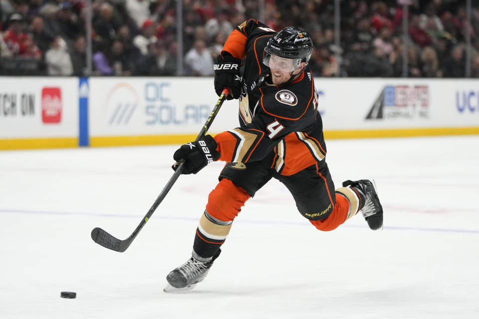 Anaheim Ducks' Cam Fowler (4) shoots during the third period of an NHL hockey game against the Chicago Blackhawks Monday, Feb. 27, 2023, in Anaheim, Calif. The Ducks won 4-2. (AP Photo/Jae C. Hong)