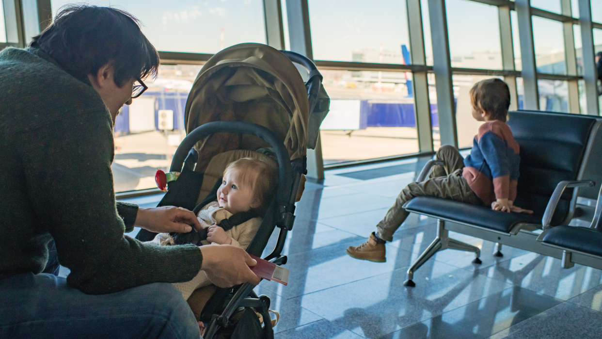 Traveling together as a family can be rewarding, but difficult. Here's how to handle airline disasters like delayed flights and lost luggage while traveling with kids. (Photo: Getty)