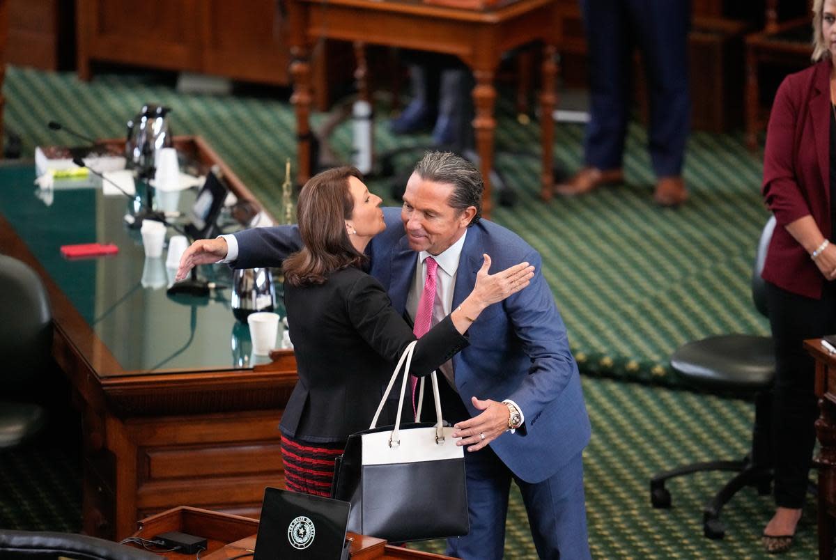 Sen. Angela Paxton, R-McKinney, hugs defense attorney Tony Buzbee after the impeachment trial of Attorney General Ken Paxton  in the Texas Senate on September 16, 2023.