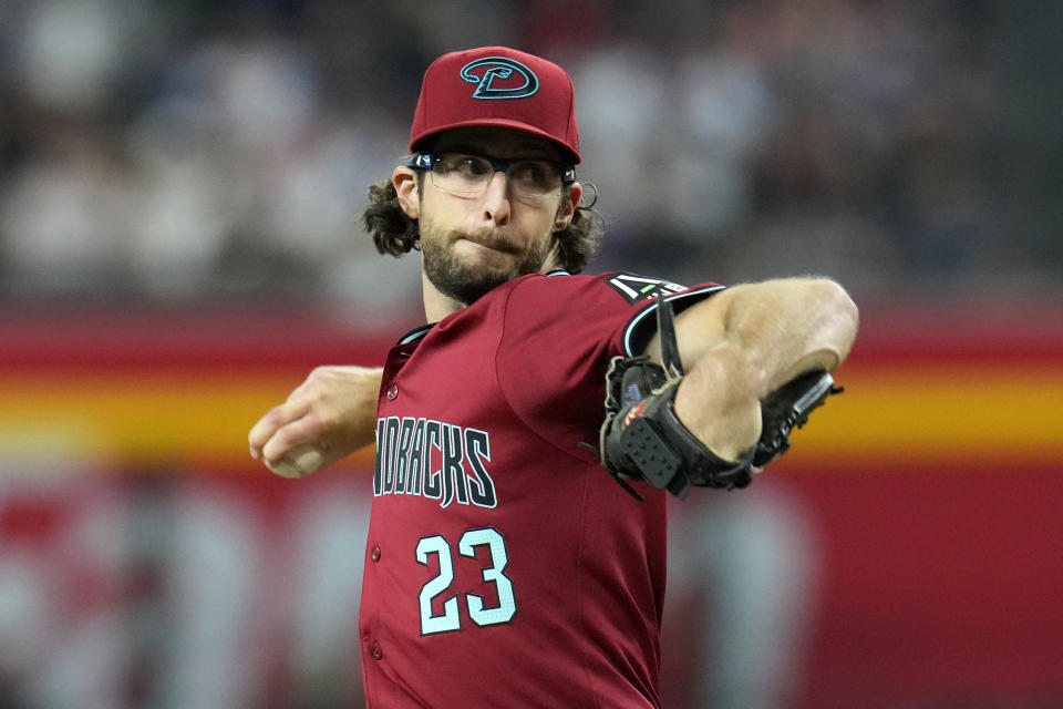 Arizona Diamondbacks pitcher Zac Gallen throws against the Toronto Blue Jays during the first inning of a baseball game, Sunday, July 14, 2024, in Phoenix. (AP Photo/Ross D. Franklin)