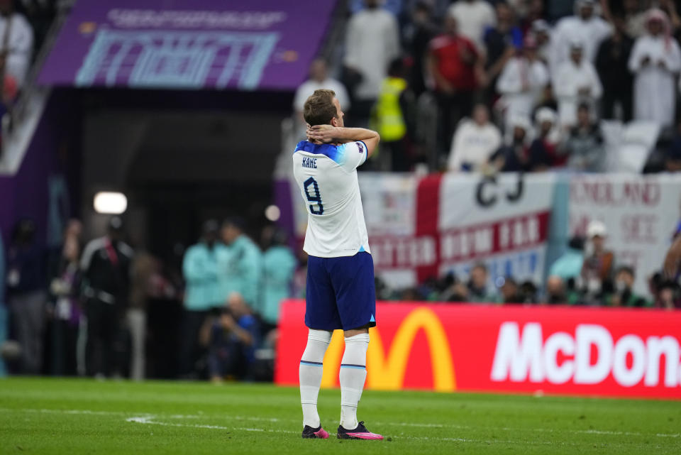 England's Harry Kane reacts during the World Cup quarterfinal soccer match between England and France, at the Al Bayt Stadium in Al Khor, Qatar, Saturday, Dec. 10, 2022. (AP Photo/Natacha Pisarenko)