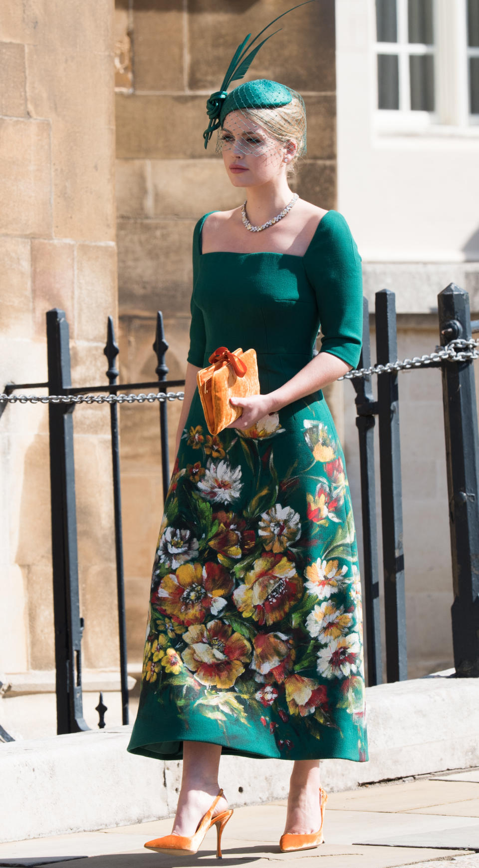 <p>For her cousin Harry’s royal wedding, Spencer tasked fashion friends Stefano Gabbana and Domenico Dolce to create her a custom, hand-painted gown. She wore the green dress with a bespoke Philip Treacy hat and Bulgari jewels. (Photo: Getty Images) </p>