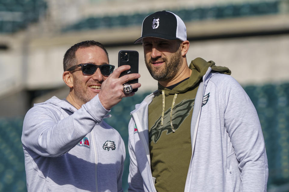 FILE - Philadelphia Eagles general manager Howie Roseman, left, looks on with head coach Nick Sirianni, right, during the Eagles Send Off Party for Super Bowl LVII, on Feb. 5, 2023, in Philadelphia. Roseman, the once-exiled executive who was cast aside for Chip Kelly for a year, returned to lead the Eagles to the franchise’s only Super Bowl title is back again after hitting rock bottom in 2020. (AP Photo/Chris Szagola, File)