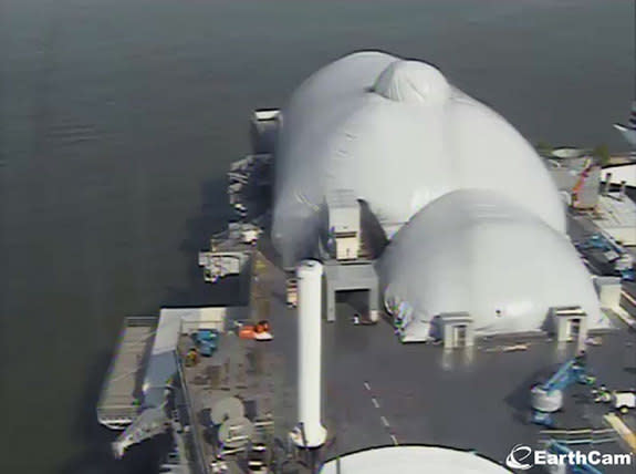 Webcam view of the fully-inflated pavilion covering the space shuttle Enterprise on the flight deck of the Intrepid Sea, Air & Space Museum in New York City, June 21, 2012.