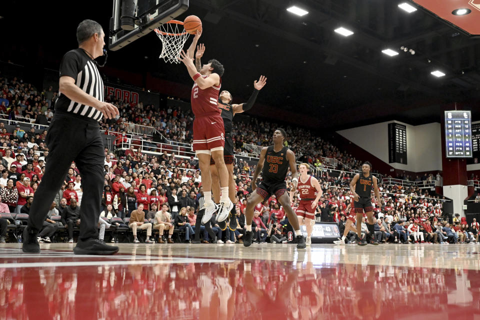 Stanford guard Andrej Stojakovic (2) scores against Southern California during the second half of an NCAA college basketball game Saturday, Feb. 10, 2024, in Stanford, Calif. (AP Photo/Nic Coury)