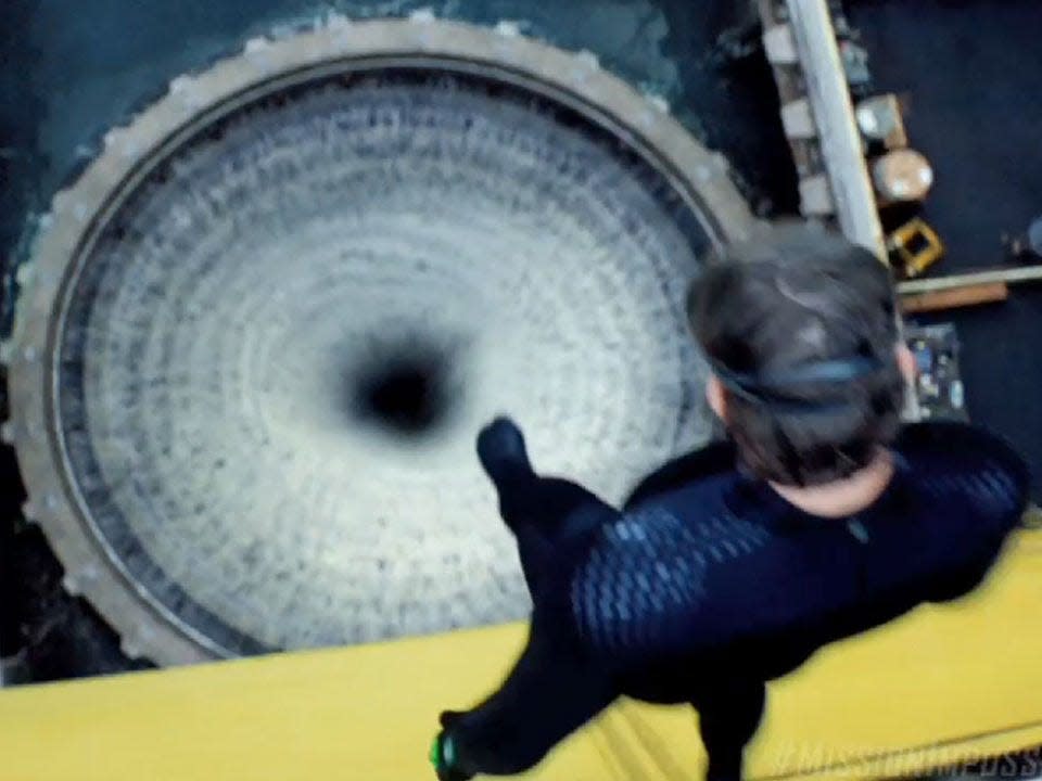 Tom Cruise preparing to jump into a water-cooled computer in "Mission: Impossible - Rogue Nation."