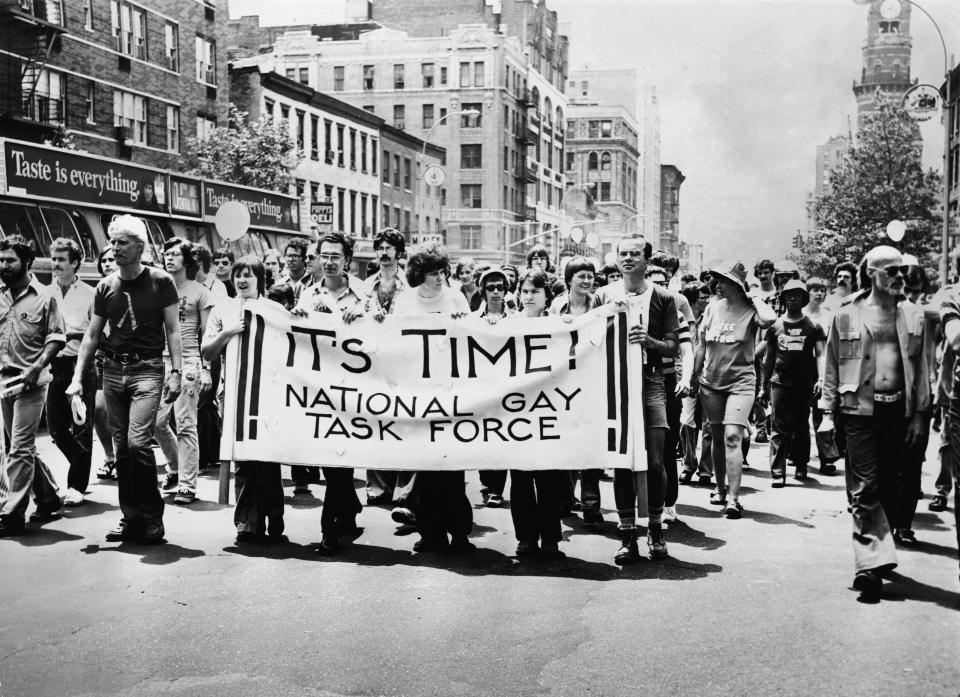 A group, led by several people carrying an 'It's Time! National Gay Task Force' banner, marches up Sixth Avenue during the annual Gay Pride parade in New York City, June 29, 1975.&nbsp;