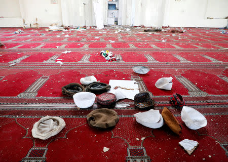 Hats are seen inside a mosque after a blast in Kabul, Afghanistan May 24, 2019. REUTERS/Omar Sobhani