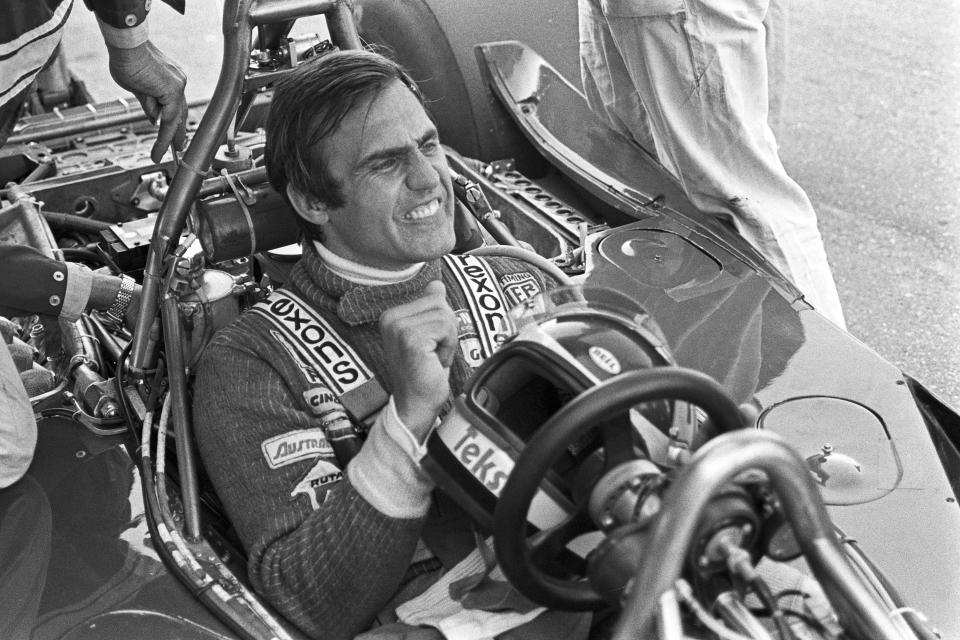 Pictured here in 1977, Carlos Reutemann pumps his fist during the Grand Prix of the Netherlands.