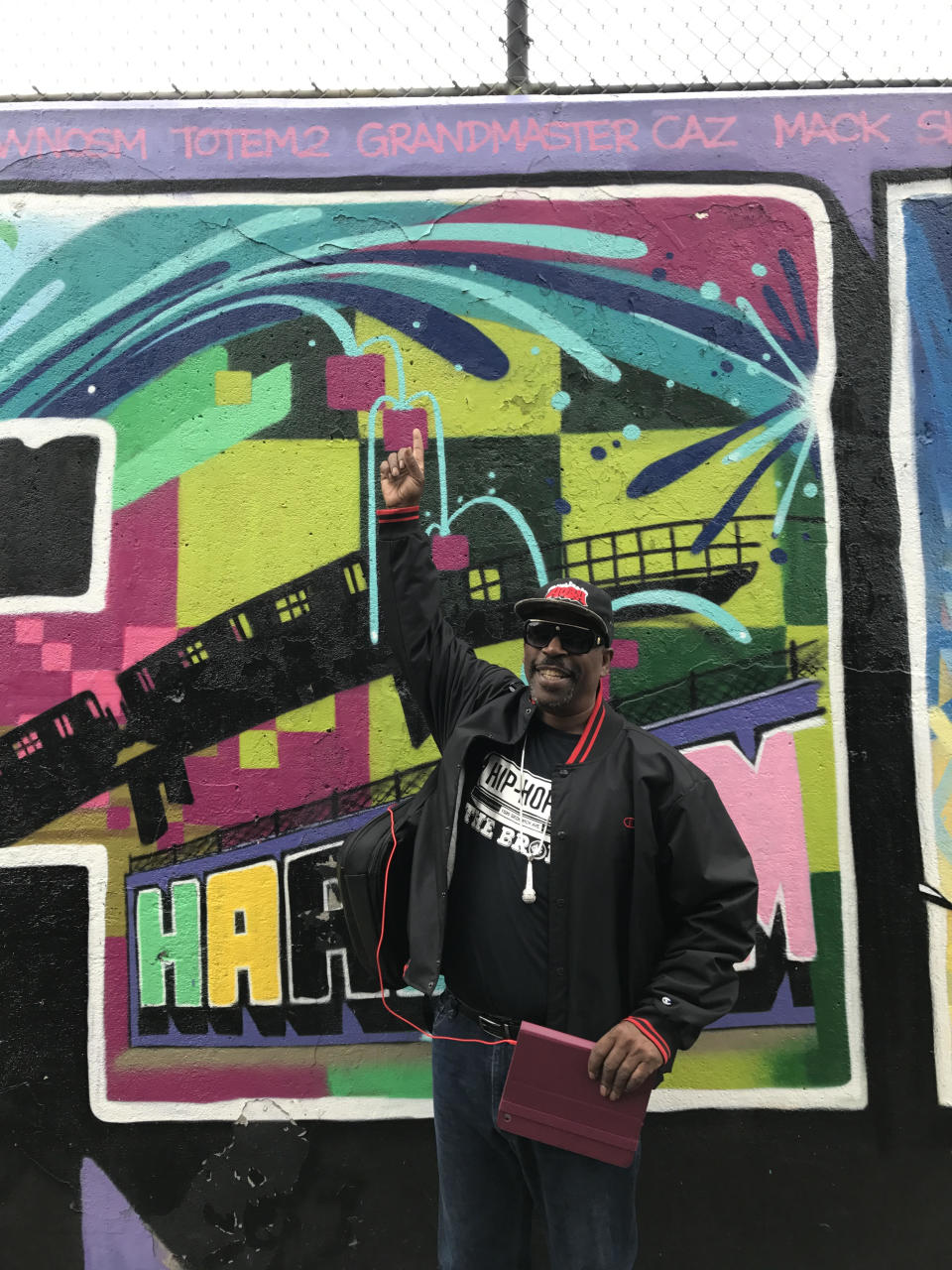 Hip Hop legend Grandmaster Caz in front of his name on the Harlem Hip Hop tour. Source: Aletha Wilkinson