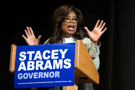 Oprah Winfrey takes part in a town hall meeting with Democratic gubernatorial candidate Stacey Abrams ahead of the mid-term election in Marietta, Georgia, U.S. November 1, 2018. REUTERS/Chris Aluka Berry