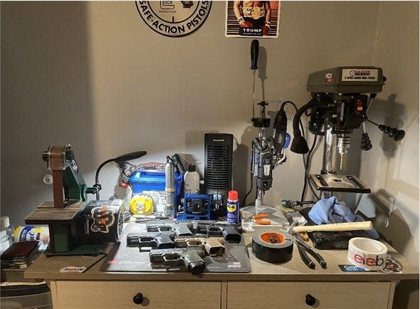 The U.S. Attorney in Manhattan says Robert Alcantara operated a "ghost gun factory" from his home in Providence, providing this photograph as evidence.