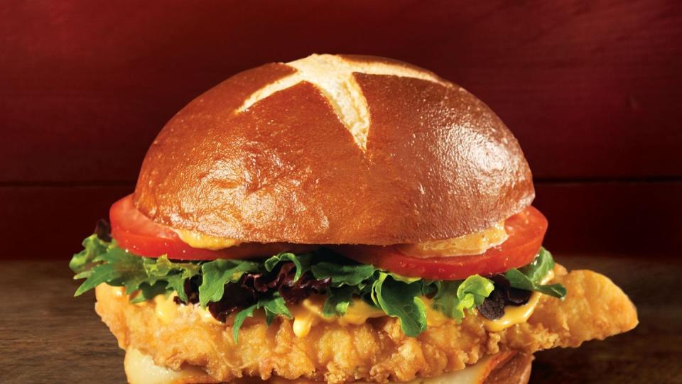 <p>Yes, this is in fact the same caliber of a pub sandwich that you’ll find at a local pub in Dublin, Ireland. This “Fresh, Never Frozen” chain recently released their <a href="https://www.wendys.com/made-crave?gclid=CjwKCAjwiOv7BRBREiwAXHbv3G02MZPSS9c0-4JkuwXkAAud44AKQEZwr4aJun1aejXhS3bWzBqywxoCmScQAvD_BwE#chicken" rel="nofollow noopener" target="_blank" data-ylk="slk:Pretzel Bacon Pub Chicken Sandwich;elm:context_link;itc:0;sec:content-canvas" class="link ">Pretzel Bacon Pub Chicken Sandwich</a> and I hope they never remove it from the menu. Not only is the chicken crispy and juicy, but the unique condiments such as warm beer cheese sauce, applewood smoked bacon, smoky honey mustard and crispy fried onions just make it one-of-a-kind. And the best part? A pretzel bun, literally my dreams in the form of a sandwich. </p>