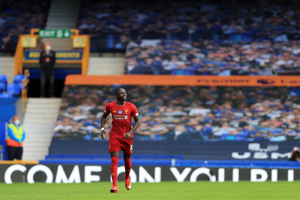 Liverpool's Sadio Mané jogs back to the midfield line after everyone else took a knee before Sunday's Merseyside derby. (Photo by Simon Stacpoole/Offside/Offside via Getty Images)