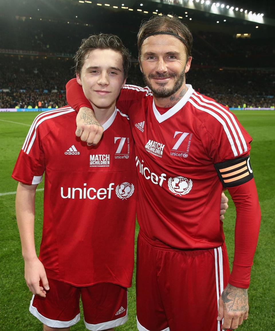 <p>Brooklyn Beckham, the eldest of Victoria and David Beckham's four kids, is quickly inheriting his soccer star dad's handsome looks. </p>