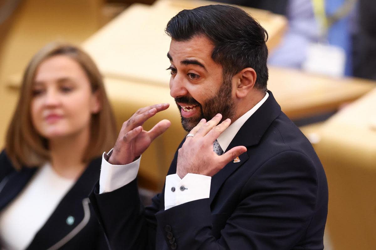 Scottish First Minister Humza Yousaf reacts as he answers questions during First Minister's Questions at Scottish Parliament at the Scottish Parliament Building on April 25, 2024 <i>(Image: Jeff J Mitchell/Getty Images)</i>