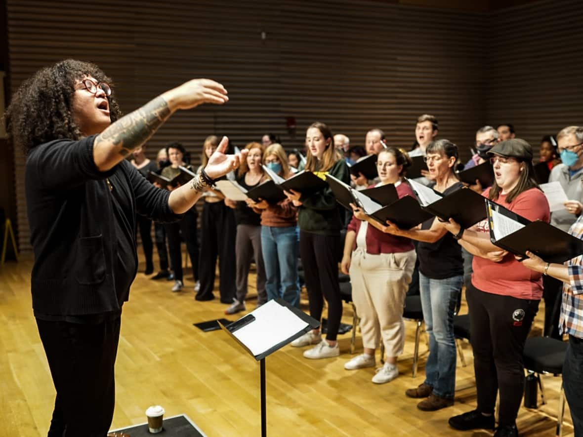 Guest professor from Hawaii, Jace Kaholokula Saplan, conducted the Brock University Choir, Avanti Chamber Singers and the Sora Singers at the St. Catherines FirstOntario Performing Arts Centre Recital Hall on Oct. 28 at 7:30 p.m. (Rachel Rensink-Hoff - image credit)