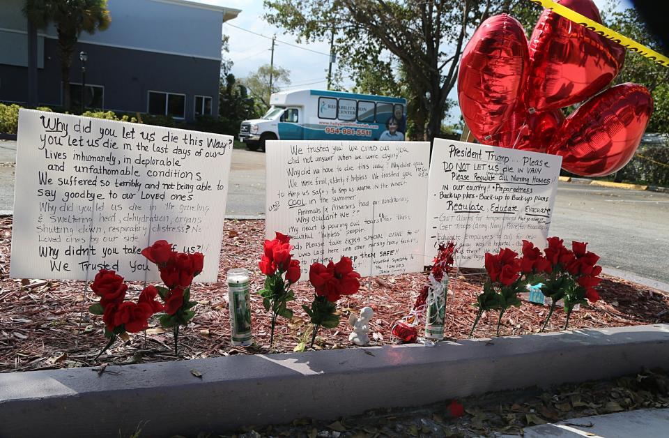 Messages have been left on the sidewalk of the Rehabilitation Center at Hollywood Hills in the days since 11 patients fell ill and eventually died. (Photo: Pedro Portal/El Nuevo Herald via Getty Images)