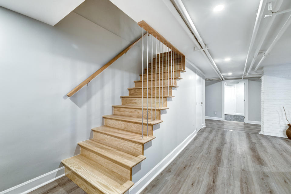 newly flipped house with gray walls and gray floors