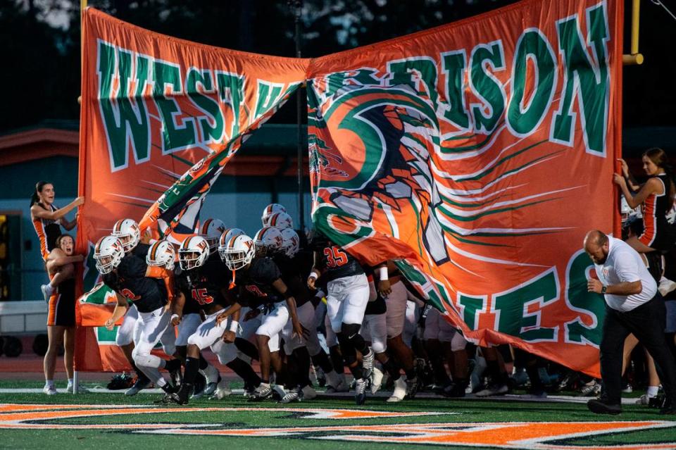 The West Harrison Hurricanes football team takes the field for a game against Moss Point at West Harrison High School in Gulfport on Friday, Sept. 22, 2023. Hannah Ruhoff/Sun Herald