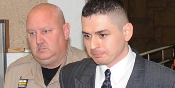 Philip Vonville, then 30, of Blakeslee, is led out of court in handcuffs by Monroe County deputy Gary Steinberg after being convicted of third-degree murder in 2010. After a 2020 retrial ended in a mistrial, a third trial is set to start Tuesday, Oct. 10, 2023.