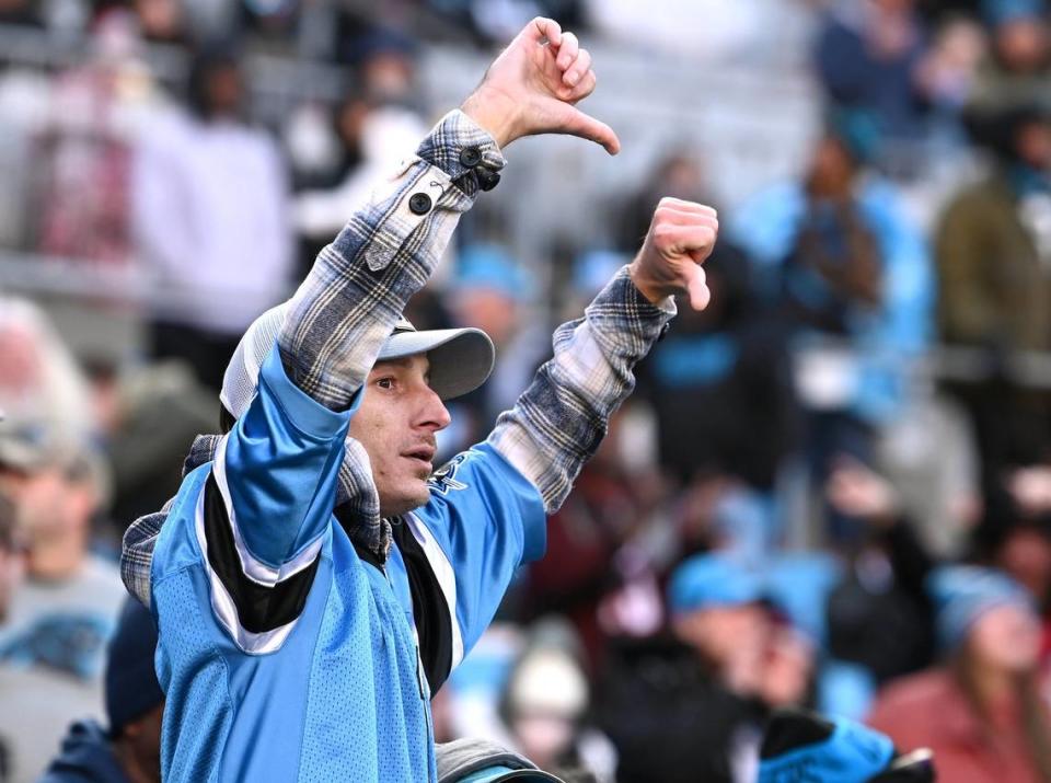 A Carolina Panthers fan gives the thumbs down to the officiating crew during the team’s game against the Tampa Bay Buccaneers at Bank of America Stadium in Charlotte, NC on Sunday, January 7, 2024. The Buccaneers defeated the Panthers 9-0. JEFF SINER/jsiner@charlotteobserver.com