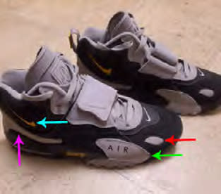   The person wore black and light gray Nike Air Max Speed Turf shoes with a yellow logo.  (FBI)
