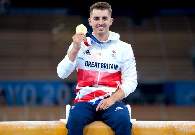 Whitlock with his gold medal in Tokyo (Mike Egerton/PA)