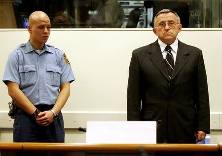 Serbian General Vladimir Lazarevic (R) is seen during his initial appearance at the U.N. War crimes tribunal in The Hague, the Netherlands, February 7, 2005. REUTERS